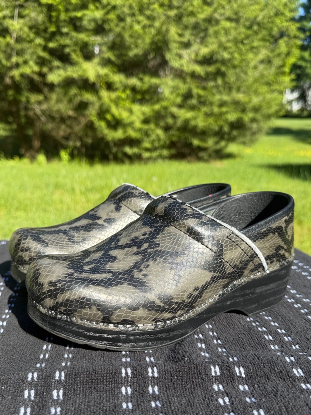 Dansko Snake Print Leather Clogs in Olive and Black